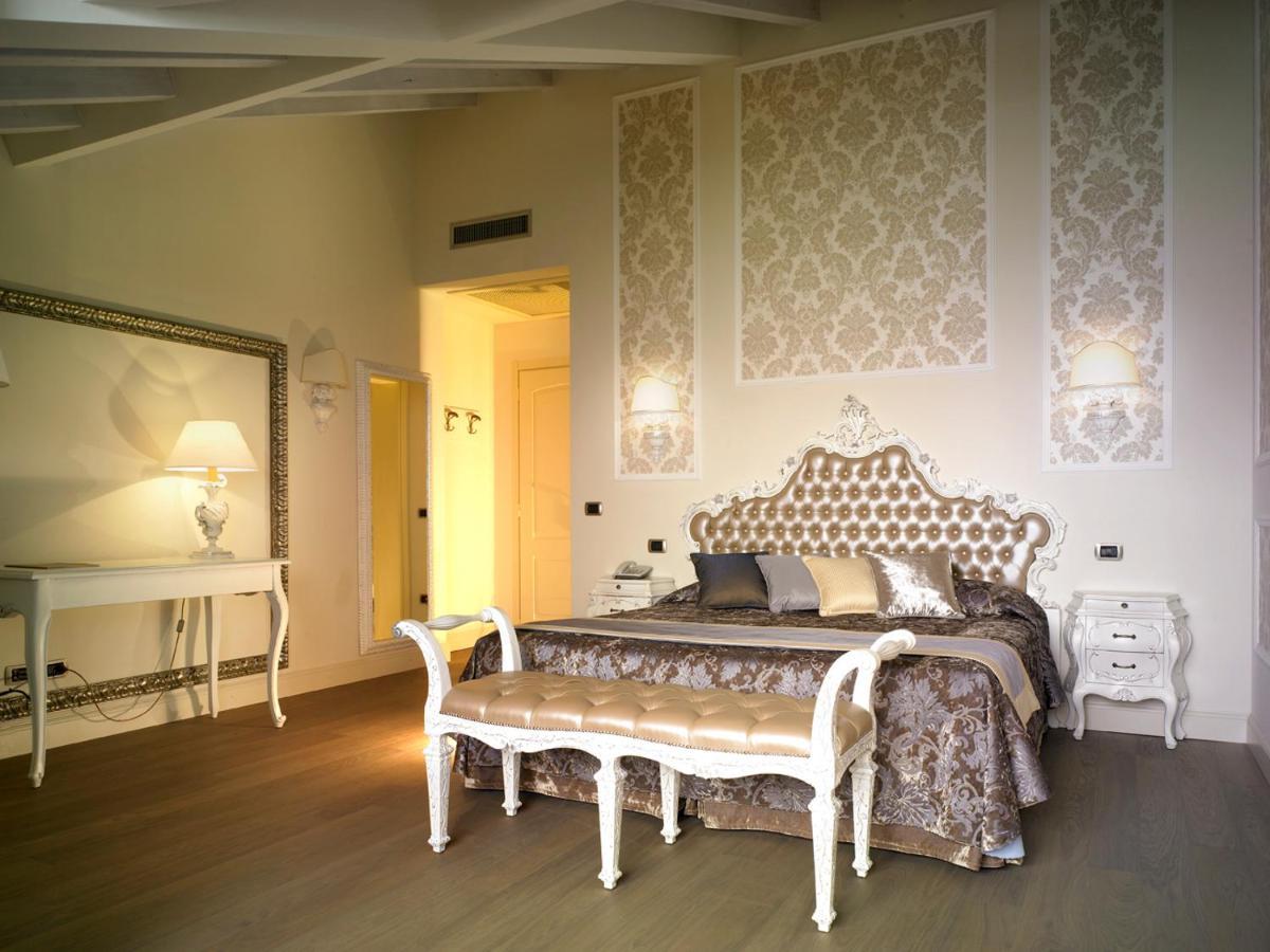 Hotel Villa Del Sogno การ์โดเน ริเวียรา ห้อง รูปภาพ
